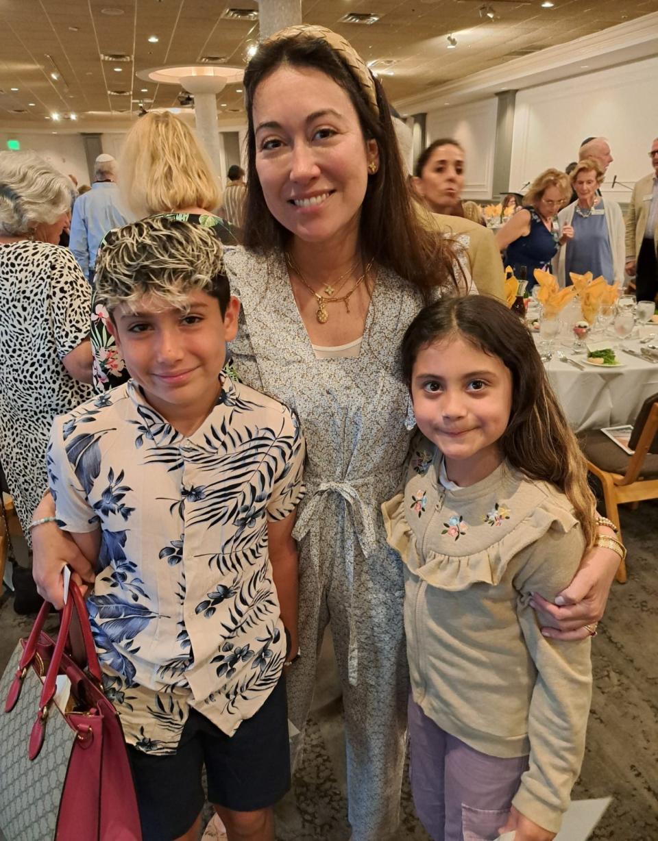 Dr. Naomi Silva with her children Avya and Ishaan at Passover Seder.