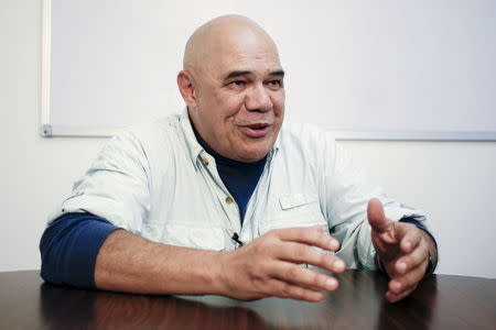 Jesus Torrealba, secretary of the Venezuelan coalition of opposition parties (MUD), gestures during an interview with Reuters in Caracas November 23, 2015. REUTERS/Marco Bello