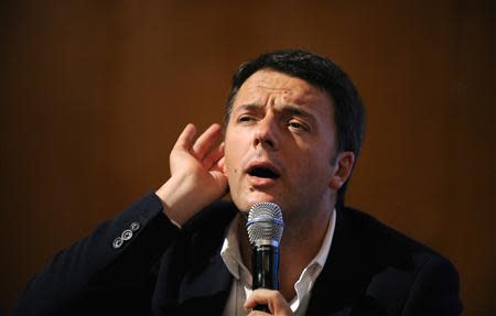 Florence mayor Matteo Renzi gestures during a political meeting in Turin December 6, 2013. REUTERS/Giorgio Perottino