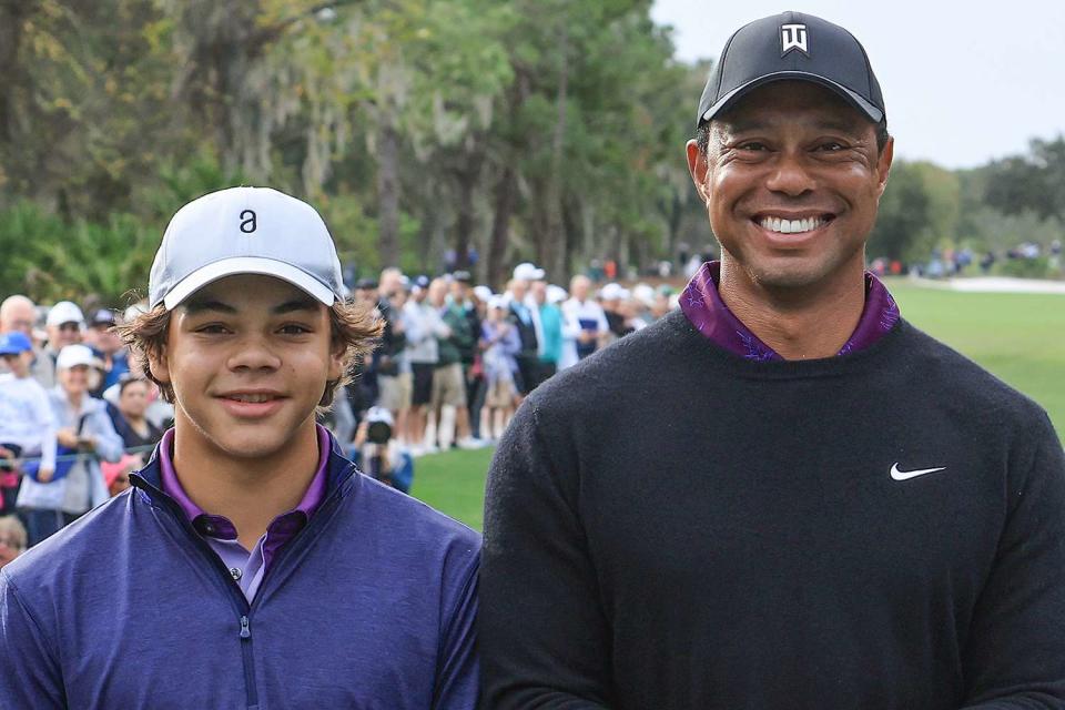 <p>David Cannon/Getty</p> Charlie Woods and Tiger Woods at the PNC Championship 2023 in Orlando, Florida