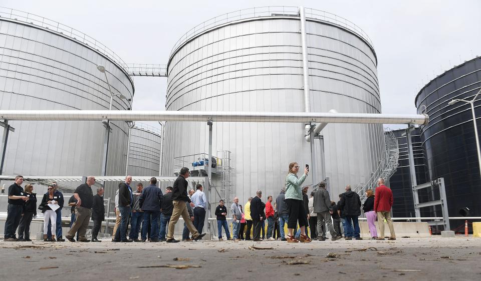 Visitors on Friday look around a the Verbio plant in Nevada, the first industrial-scale renewable natural gas facility in North America using agricultural residue as its feedstock.