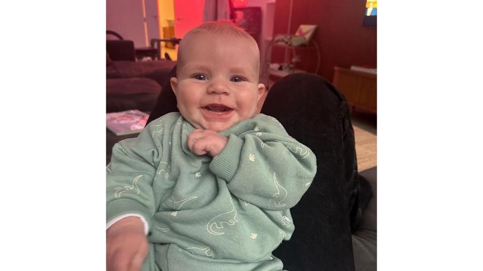 Gordon Ramsay's son Jesse grinning in a green jumper
