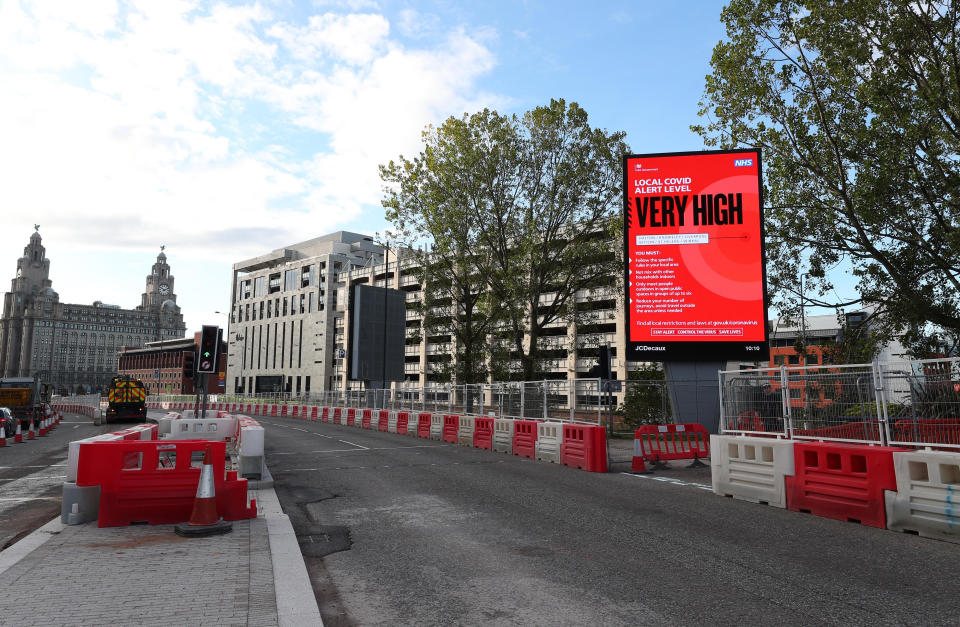 A Covid alert level sign in Liverpool after Prime Minister Boris Johnson set out a new three-tier system of alert levels for England following rising coronavirus cases and hospital admissions.