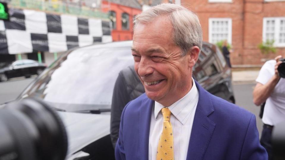 Nigel Farage arrives at Trump fundraiser in London