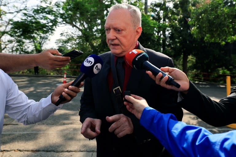 Jurgen Mossack, one of the main defendants in a trial linked to the 'Panama Papers' tax evasion scandal, speaks to reporters outside court (MARTIN BERNETTI)