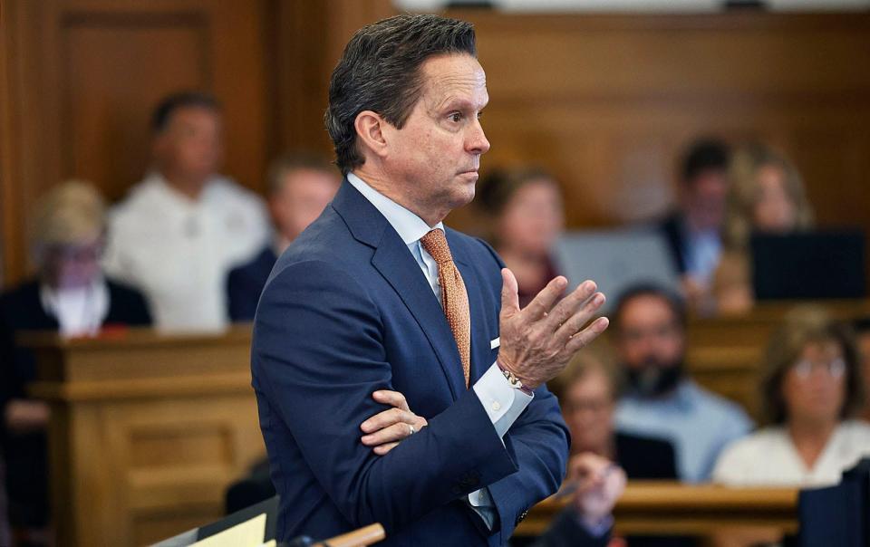 Defense lawyer Alan Jackson cross-examines Massachusetts State Trooper Michael Proctor about text messages with friends 16 hours into his investigation during Karen Read's trial on murder charges in Norfolk Superior Court in Dedham on Wednesday, June 12, 2024.