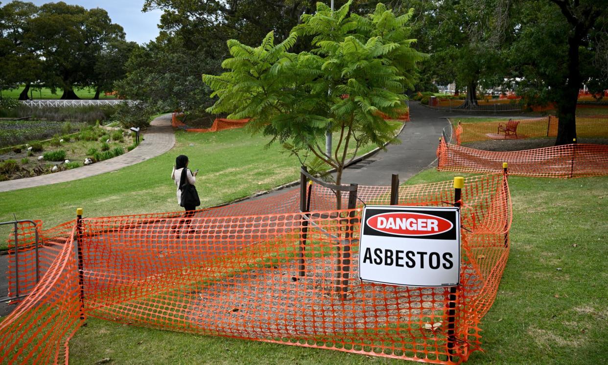 <span>An asbestos sign at Victoria Park. Hundreds of sites could be contaminated with the EPA investigating mulch supply chains. </span><span>Photograph: Dan Himbrechts/EPA</span>