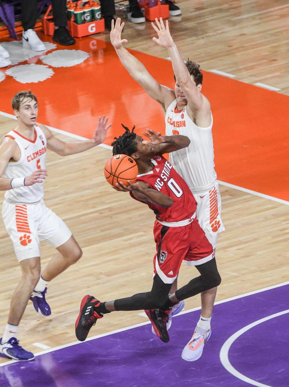 North Carolina State guard Terquavion Smith (0) shoots near Clemson sophomore forward Ben Middlebrooks (10) during the first half at Littlejohn Coliseum in Clemson, S.C. Friday, December 30, 2022.