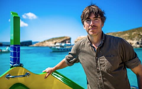 Simon Reeve filming in the Mediteranean - Credit: BBC
