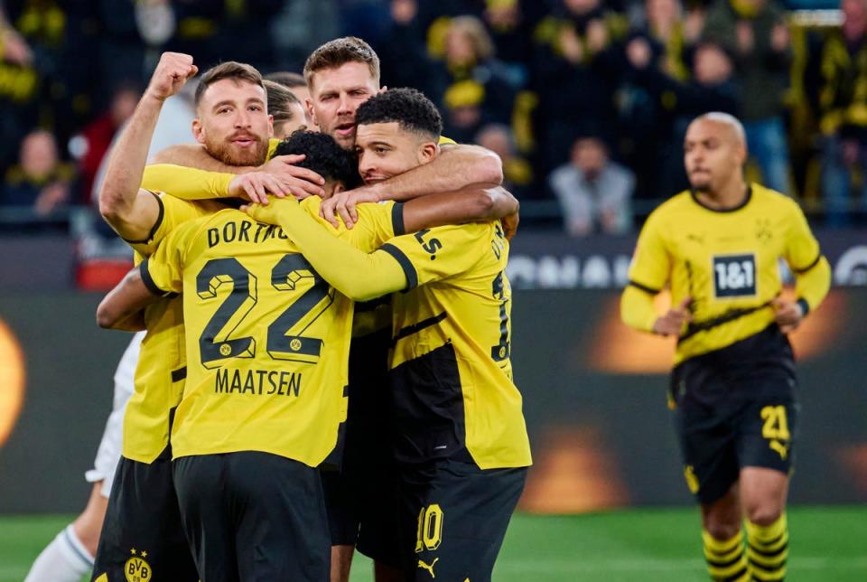 Niclas Fullkrug celebrates with his Dortmund teammates (AP)