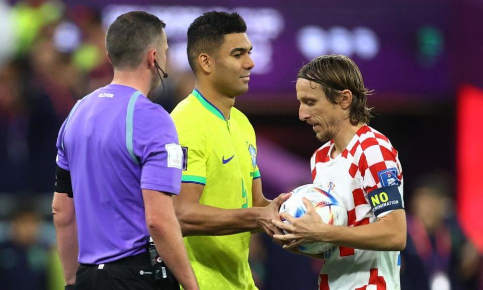 Croatia’s Luka Modric passes the ball to Brazil’s Casemiro during the penalty shootout