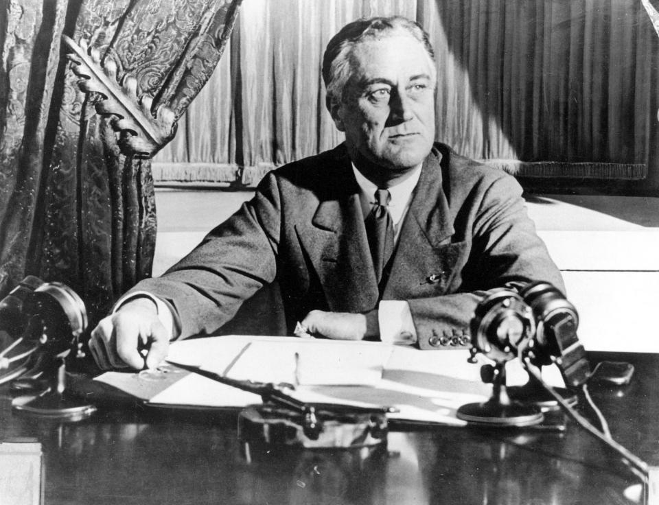 FILE - In this March 1933, file photo, President Franklin D. Roosevelt delivers his first radio "fireside chat" in Washington. The New Deal was a try-anything moment during the Great Depression that remade the role of the federal government in American life. (AP Photo)