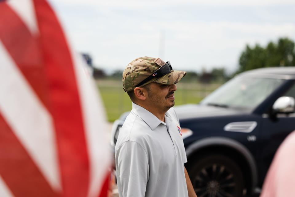 Retired U.S. Army Sgt. William Davis III laughs after receiving his new car at Ellison Park in Layton on June 17, 2023. | Ryan Sun, Deseret News