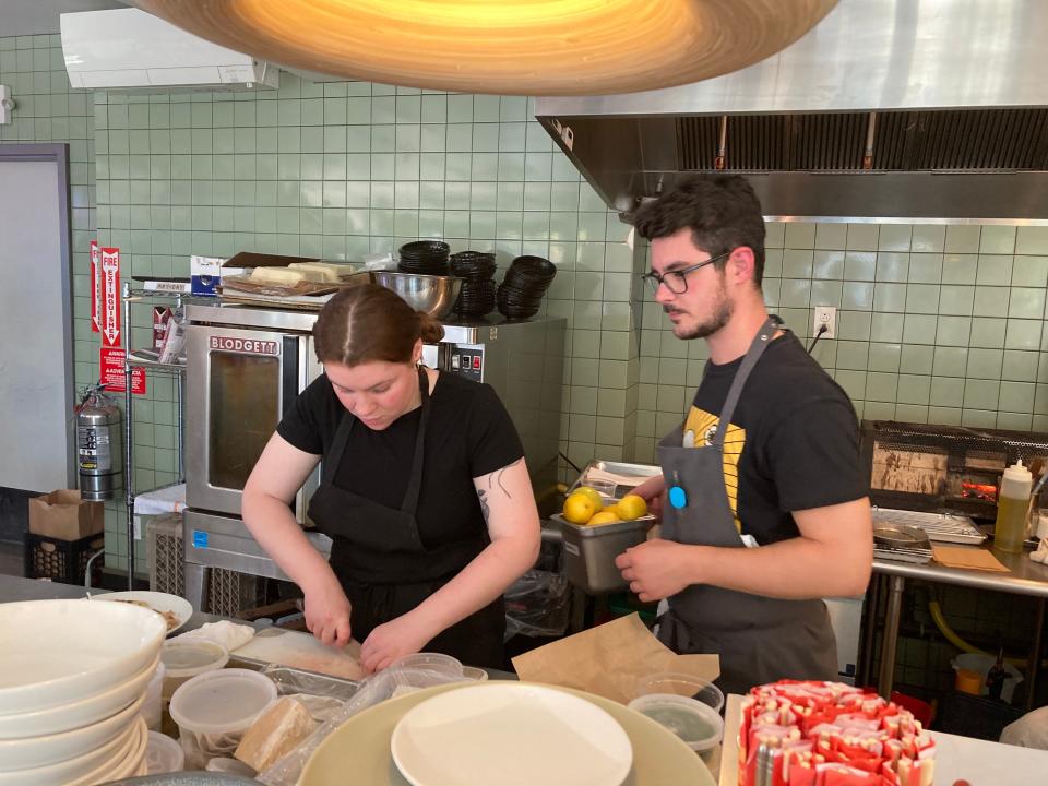 Mojo Hancy-Davis, right, chef and co-owner of May Day, works with Abby Steinhauer in the kitchen of the Burlington restaurant June 24, 2022.