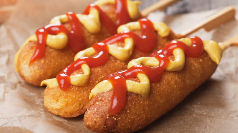 Corn dogs with toppings