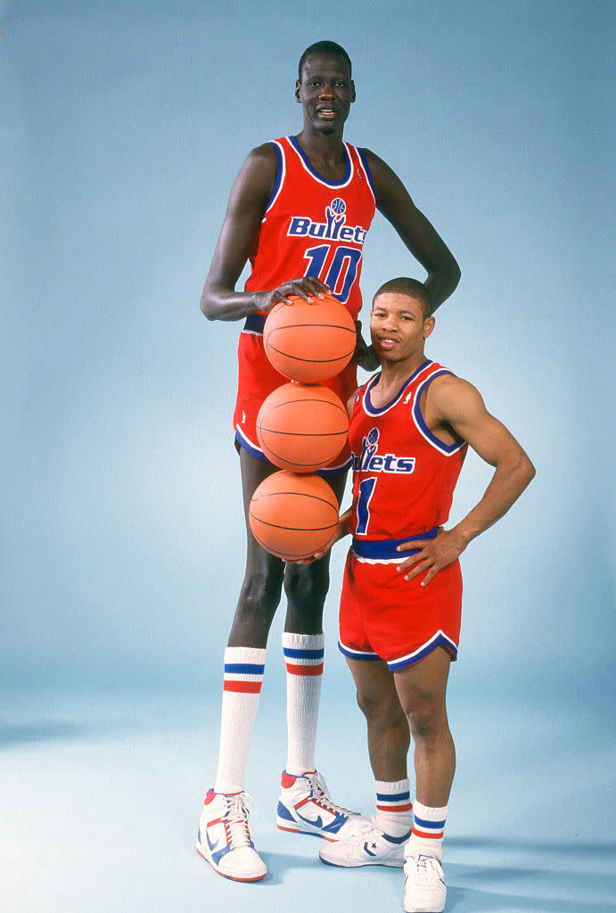 Muggsy Bogues and Manute Bol played one season together on the Washington Bullets. (Getty Images)