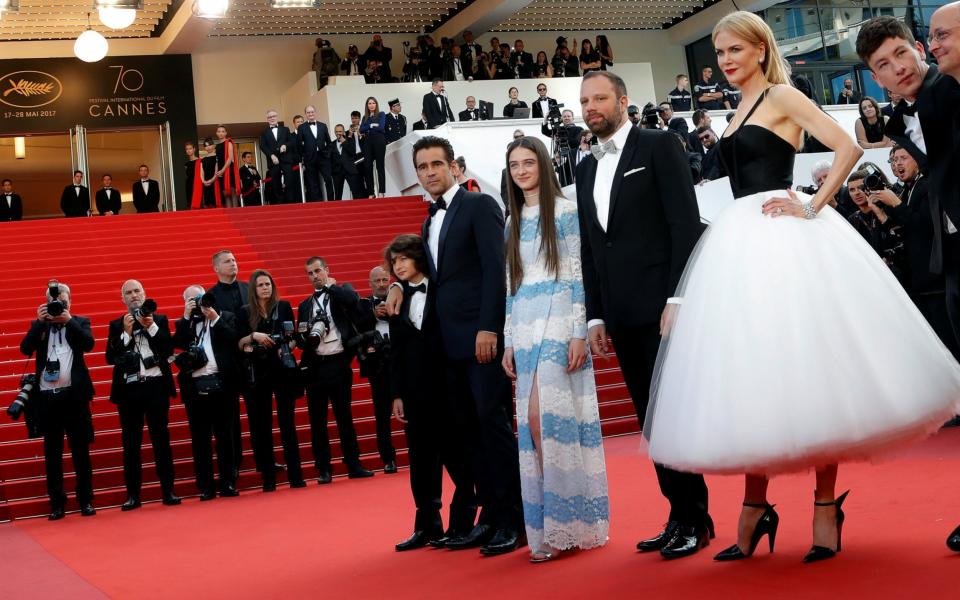 Cast members Sunny Suljic, Colin Farrell, Raffey Cassidy, Nicole Kidman, Barry Keoghan, and producer Ed Guiney pose on the red carpet - Credit: ERIC GAILLARD/REUTERS