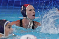 United States' goalkeeper Amanda Longan (13) plays against Canada in the fourth quarter of a quarterfinal round women's water polo match at the 2020 Summer Olympics, Tuesday, Aug. 3, 2021, in Tokyo, Japan. It is her first game at the Olympics. (AP Photo/Mark Humphrey)