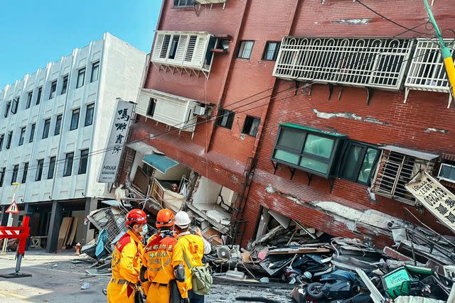 <p>Ministry of Interior / Handout /Anadolu via Getty Images</p> Firefighters in Taiwan