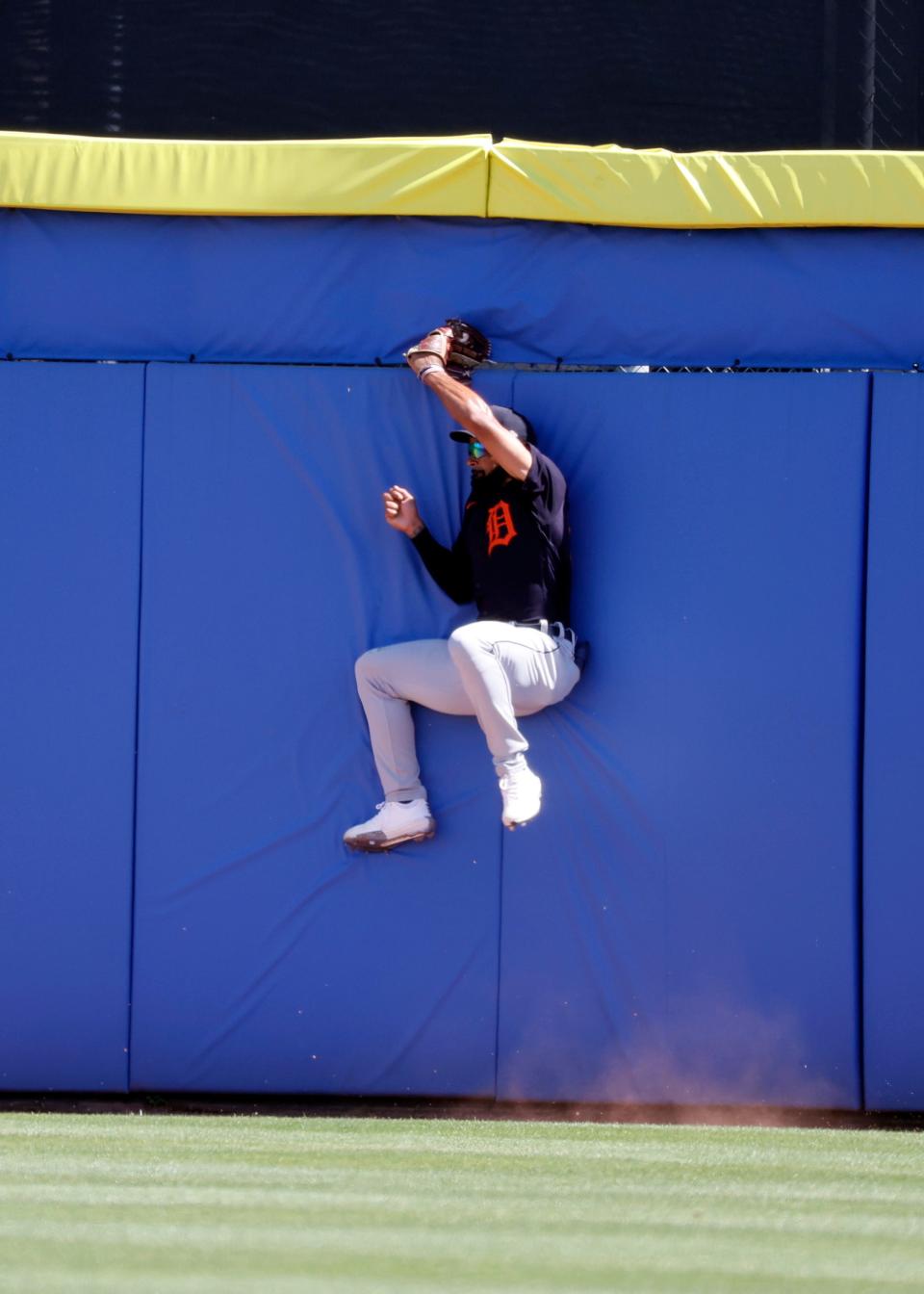 Detroit Tigers center fielder Derek Hill (54) catches a fly ball during the third inning of a spring training game against the Toronto Blue Jays on March 11, 2021, at TD Ballpark in Dunedin, Florida.