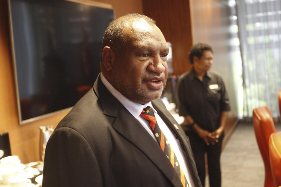 Papua New Guinea Prime Minister James Marape attends a breakfast meeting with New Zealand Prime Minister Chris Hipkins, unseen, in Port Moresby, Papua New Guinea, Monday, May 22, 2023. (AP Photo/Nick Perry)