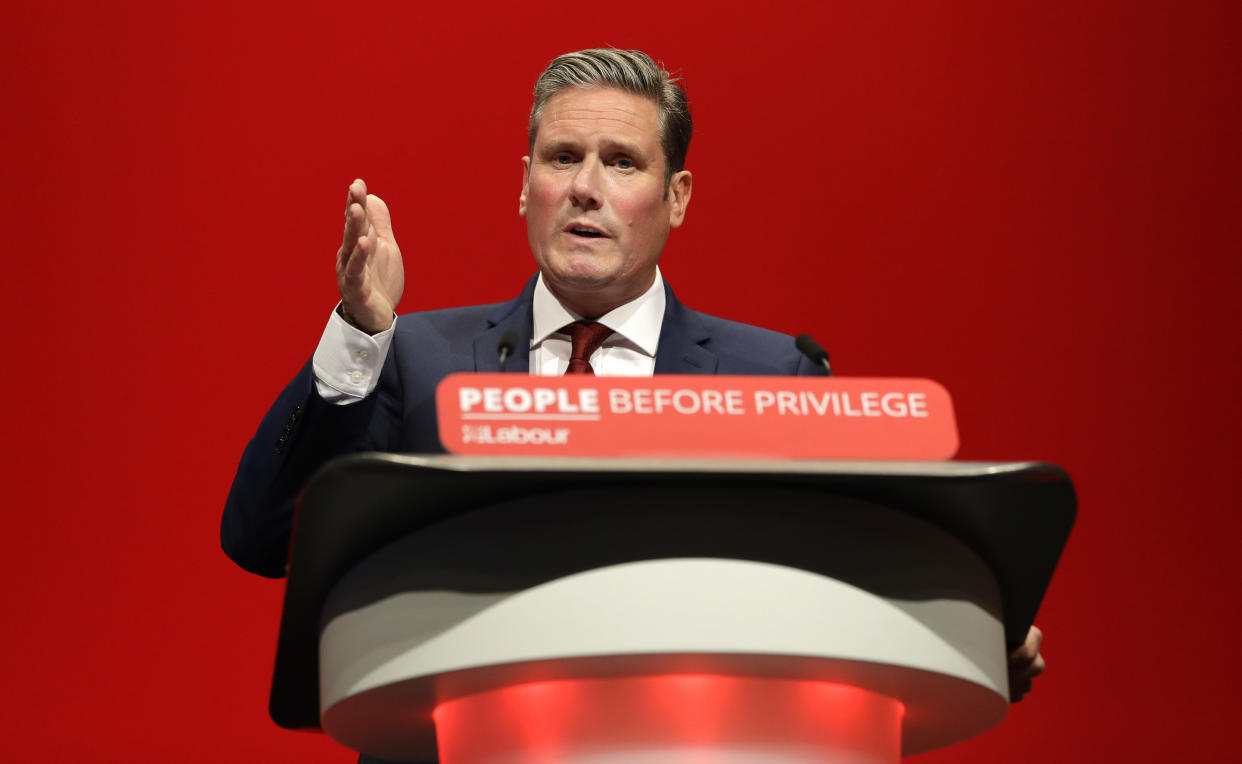 Britain's Shadow Brexit Secretary Keir Starmer speaks on stage during the Labour Party Conference at the Brighton Centre in Brighton, England, Monday, Sept. 23, 2019. (AP Photo/Kirsty Wigglesworth)