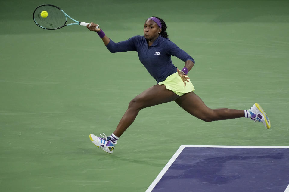 Coco Gauff, of the United States, returns to Maria Sakkari, of Greece, during a semifinal match at the BNP Paribas Open tennis tournament, Friday, March 15, 2024, in Indian Wells, Calif. (AP Photo/Mark J. Terrill)