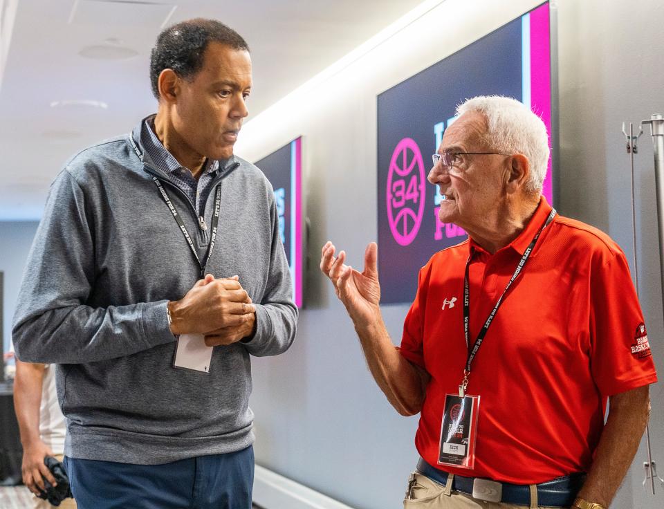 Stu Jackson, left, and Dick Bennett were among the former Wisconsin basketball coaches and players who gathered Saturday in Madison for a fundraiser for Howard Moore and a celebration of 125 years of UW basketball.