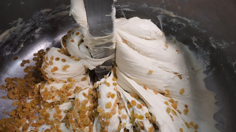 Mixing dough with dried fruit