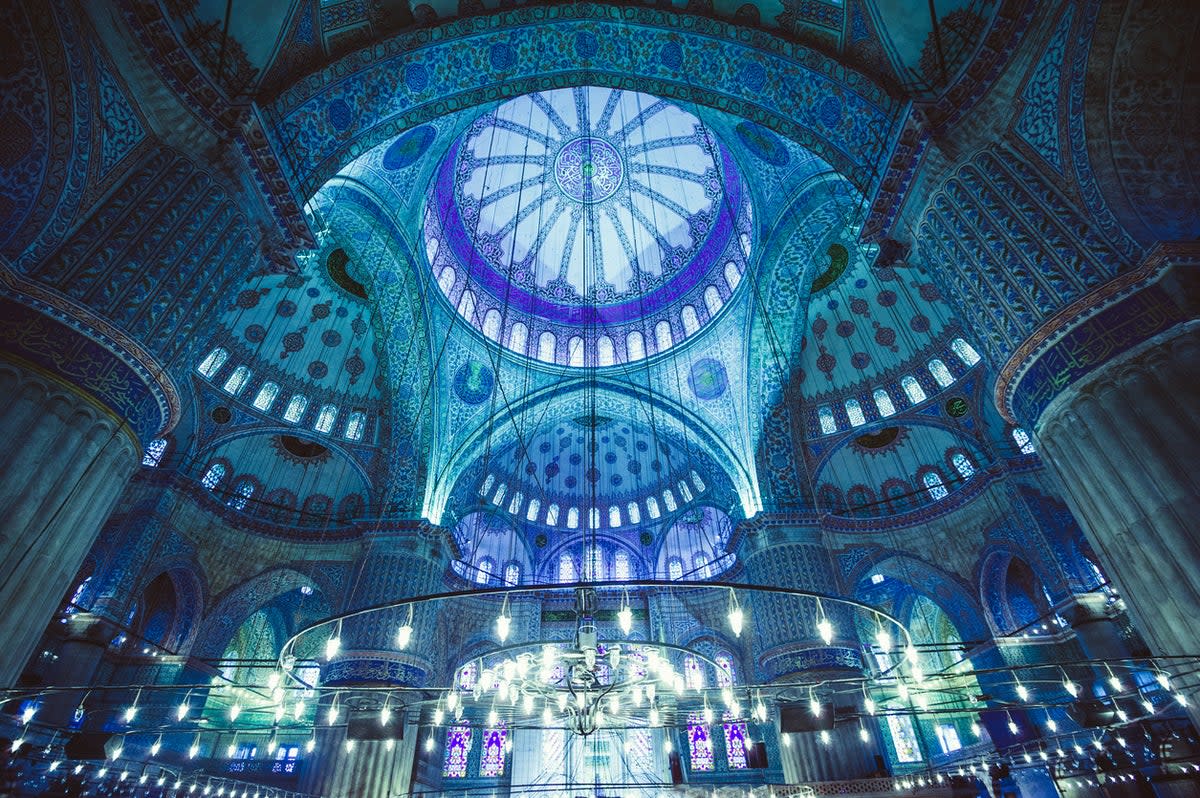 Ornate tiles of cobalt and aquamarine decorate the interior of the Sultan Ahmed Mosque (Getty Images/iStockphoto)