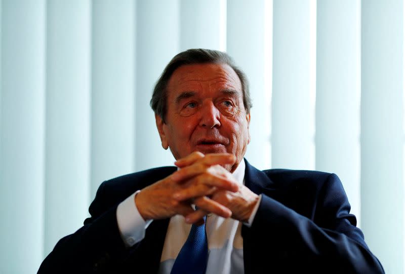 FILE PHOTO: Former German Chancellor Gerhard Schroeder is pictured during an interview with Reuters in his office in Berlin