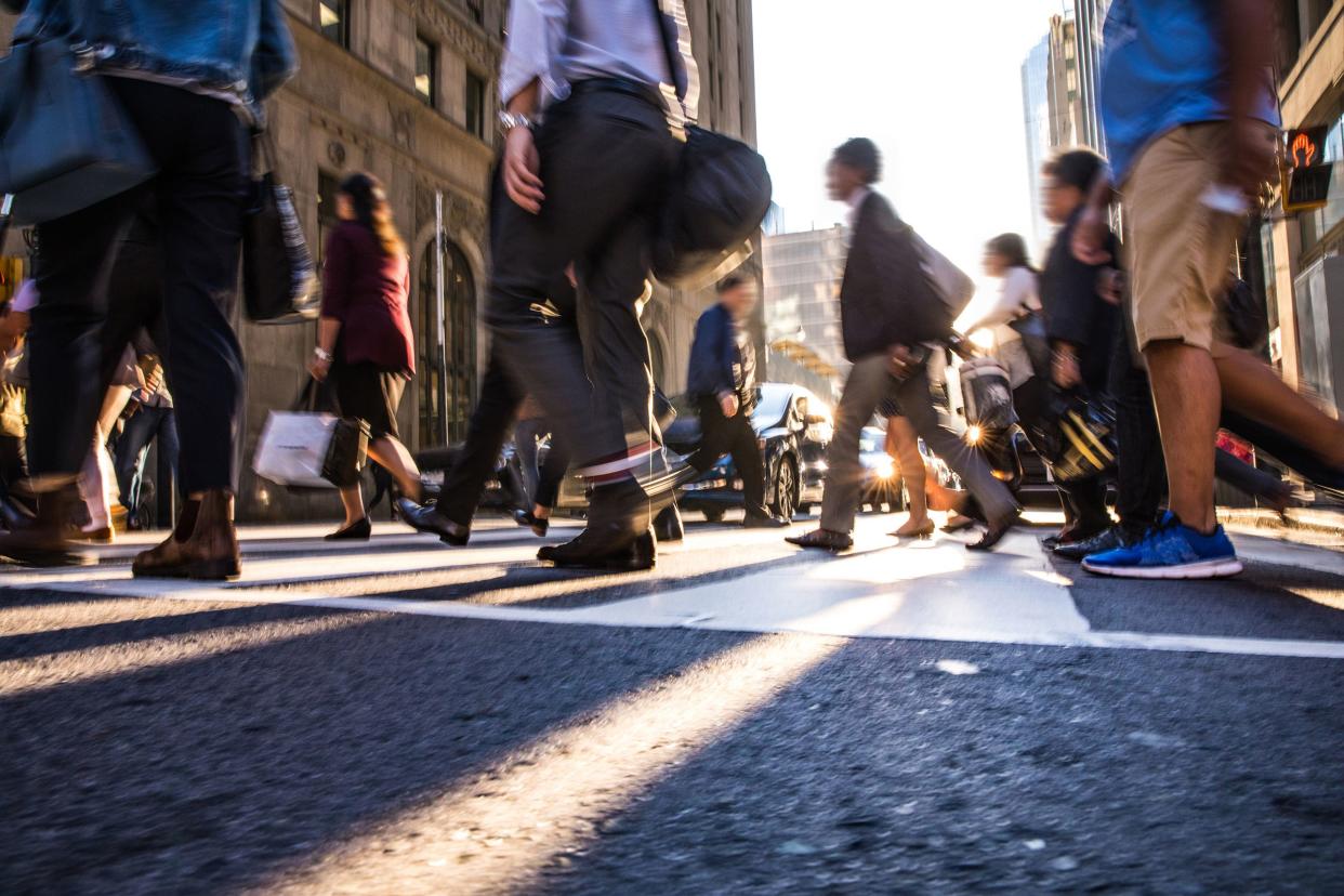 people crossing in downtown