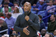 Portland Trail Blazers head coach Chauncey Billups yells to this players in the first half of an NBA basketball game against the New Orleans Pelicans in New Orleans, Tuesday, Dec. 21, 2021. (AP Photo/Matthew Hinton)