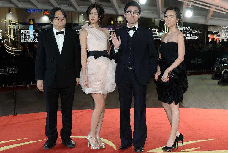 Guest, Ena Koshino, Akuya Misawa and Kiki Sugino arrive on the red carpet for the Tribute to Japanese Cinema during the 14th Marrakesh International Film Festival on December 9, 2014 in Marrakech