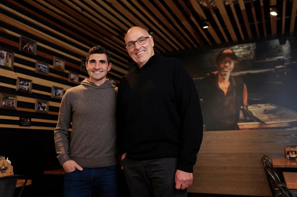 Josh Martino, left, with owner Joe Adeeb in the dining room of Bono's Pit Bar-B-Q, 10065 Skinner Lake Drive near St. Johns Town Center in Jacksonville. Martino, longtime president of the family-owned restaurant group, was named CEO when Adeeb retired Jan. 1.