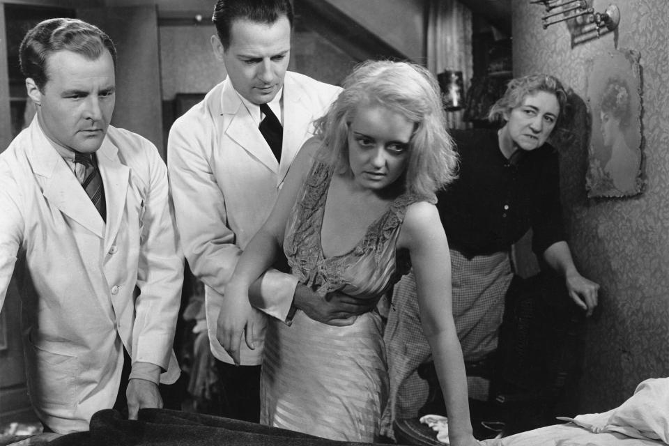 Reginald Denny, Leslie Howard, Bette Davis, and Tempe Pigott in Of Human Bondage. (Photo by �� John Springer Collection/CORBIS/Corbis via Getty Images)
