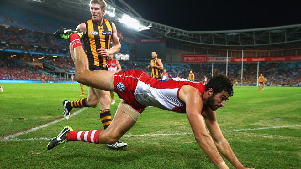 The Sydney Swans and Hawthorn Hawks, pictured here playing at ANZ Stadium in 2014. 