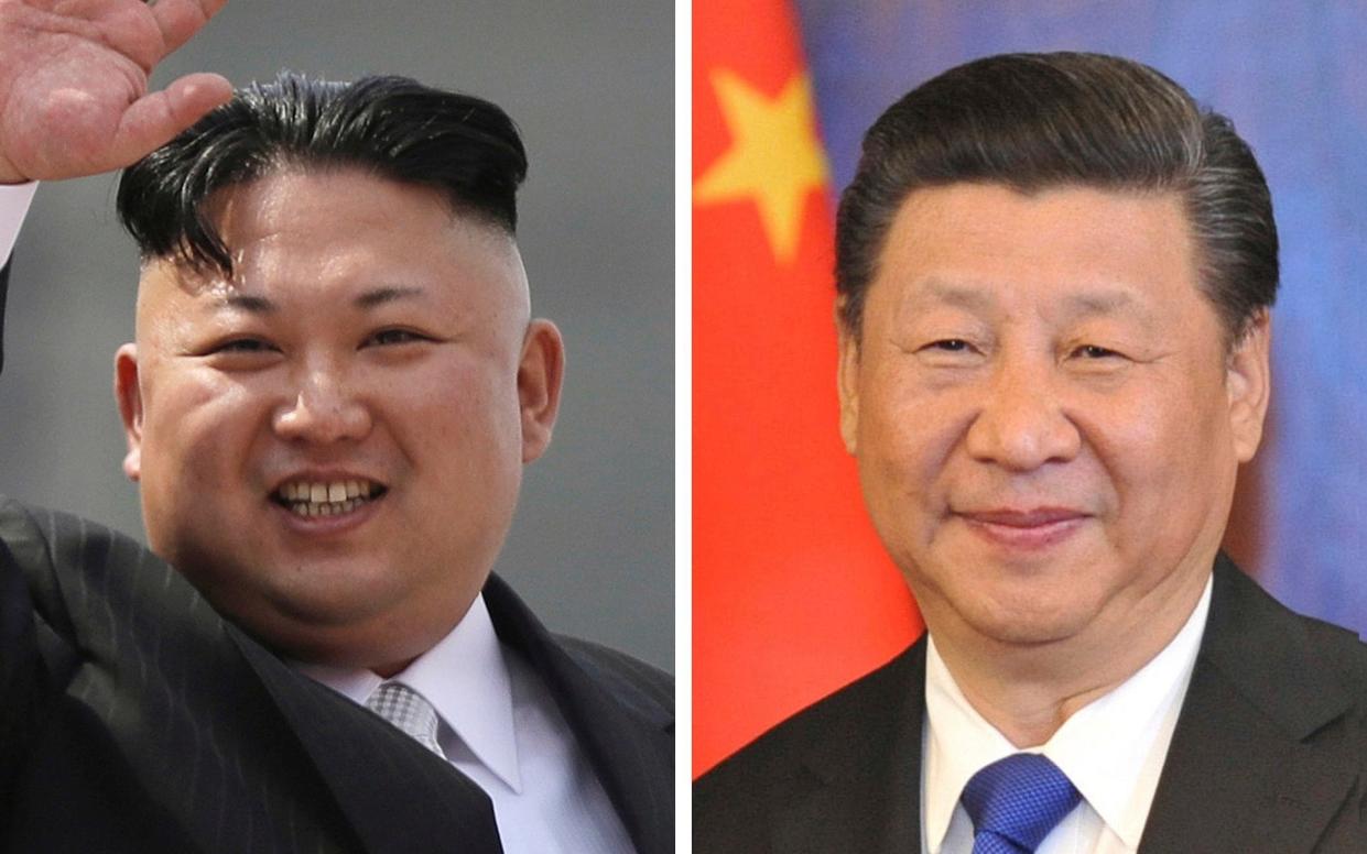 Kim Jong-un and Xi Jinping - AP