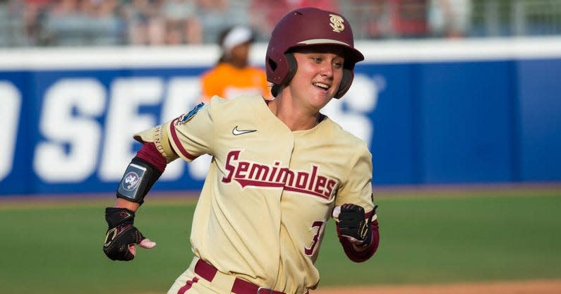 Bethaney Keen of Florida State rounds the bases during a game in the Women's College World Series