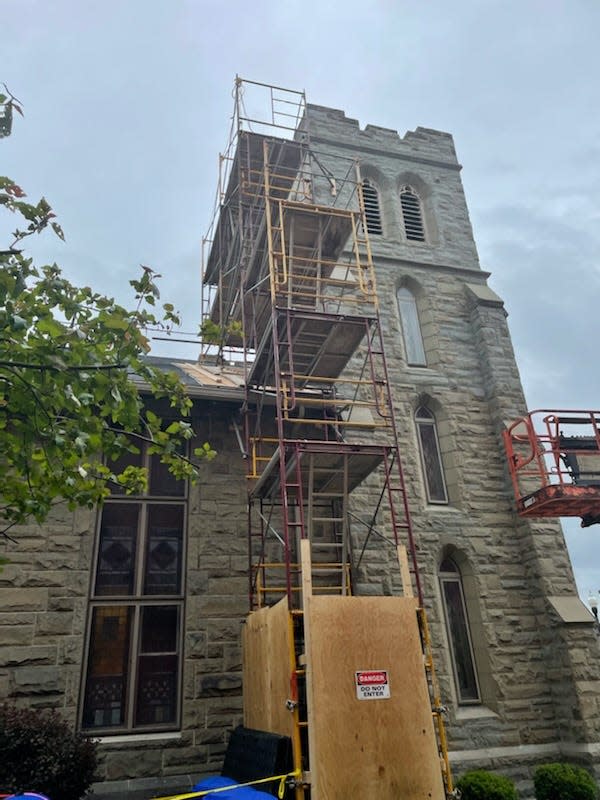 A scaffold is in place at one of the stone towers of the United Presbyterian Church of Hornell in May. R.E. Kelley, a building restoration contractor, is repairing the church towers and facade as part of a nearly $250,000 project.