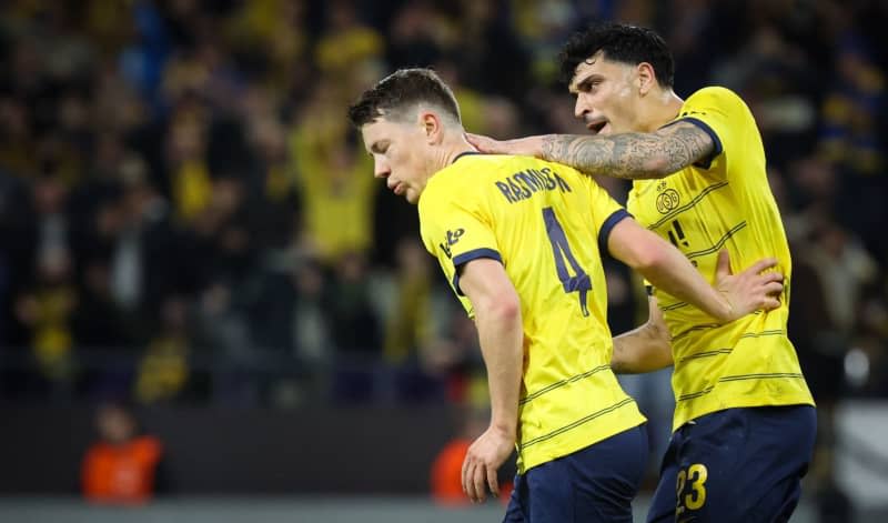 Union's Mathias Rasmussen (L) celebrates scoring his side's first goal with teammate Cameron Puertas during the UEFA Europa Conference League intermediate round first leg soccer match between Royale Union Saint-Gilloise and Eintracht Frankfurt at Lotto Park. Virginie Lefour/Belga/dpa