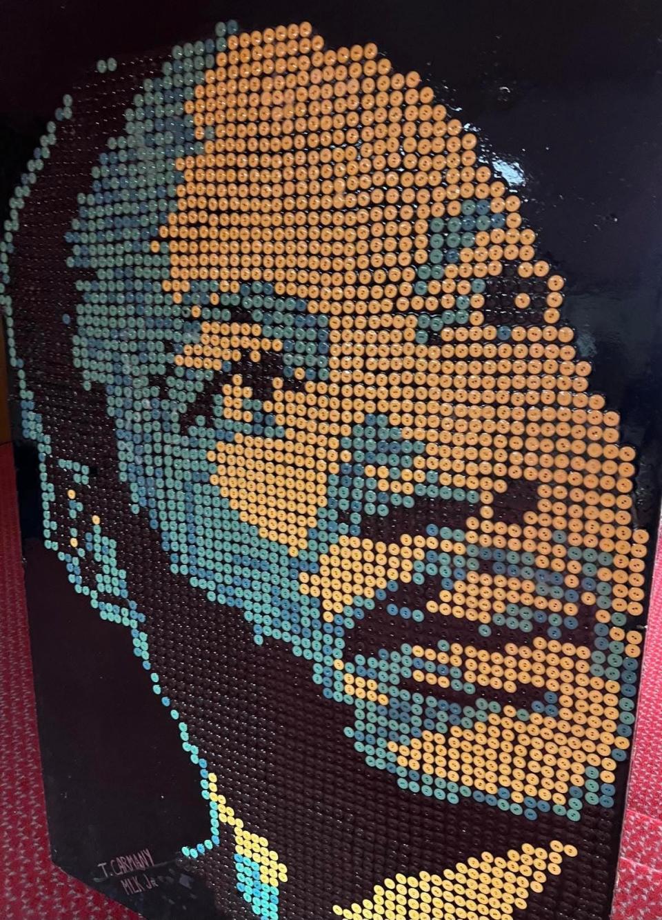 ArtsinStark has donated a portrait of Martin Luther King Jr. to McKinley High School. Local artist Tim Carmany created art piece from roughly 1,000 buttons.
