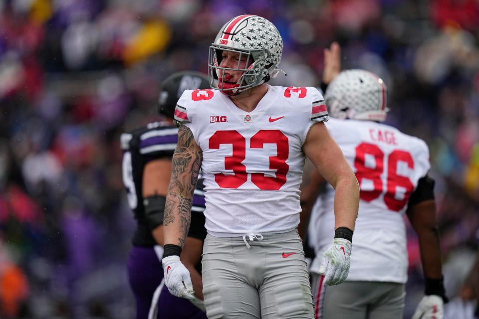 Ohio State's Jack Sawyer split reps between defensive end and the hybrid "Jack" position last year. This season, he will move to the defensive line full time.