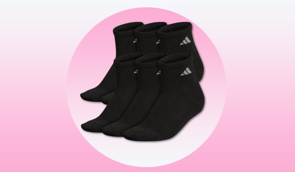 Six pairs of black Adidas ankle socks.