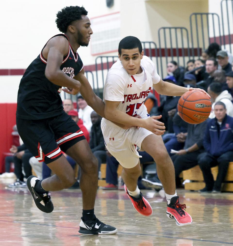 Bridgewater-Raynham's Bobby Louis is guarded by Brockton's Cameron Monteiro during a game on Tuesday, Jan. 10, 2023.