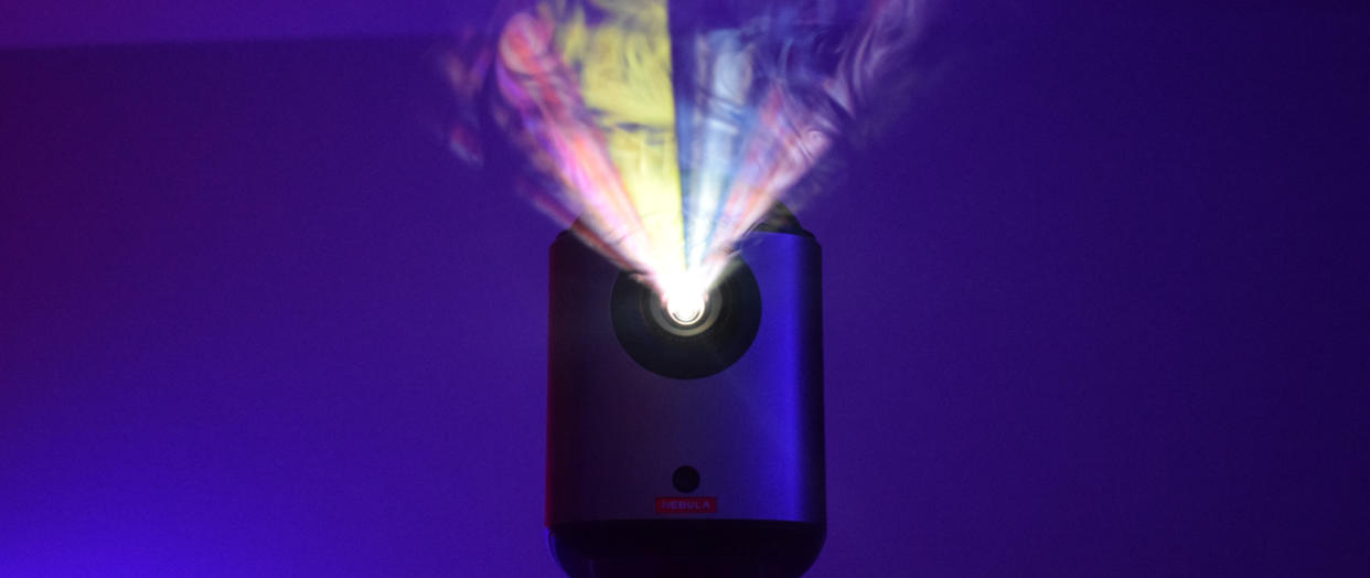  Anker Nebula Mars 3 Air projector with smoke in projection beam. 
