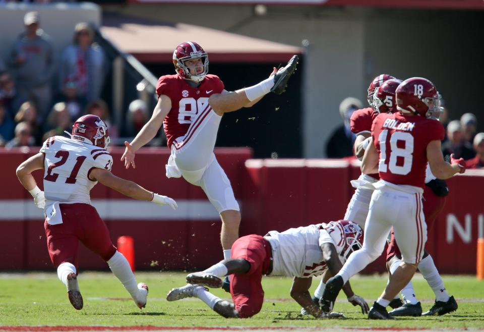 Nov 13, 2021; Tuscaloosa, Alabama, USA;  Alabama punter James Burnip (86) punts against New Mexico State at Bryant-Denny Stadium. Mandatory Credit: Gary Cosby Jr.-USA TODAY Sports