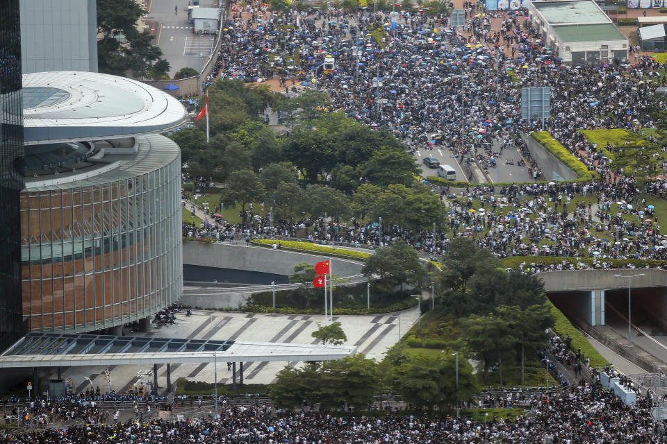 Thousands of protesters block access to the Legislative Council in Hong Kong, Wednesday, June 12, 2019. One year ago, a sea of humanity _ a million people by some estimates _ marched through central Hong Kong on a steamy afternoon. It was the start of what would grow into the longest-lasting and most violent anti-government movement the city has seen since its return to China in 1997. (AP Photo/Kin Cheung, File)