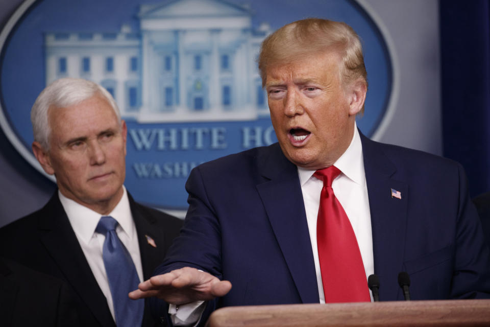 President Donald Trump, joined by Vice President Mike Pence, speaks about the coronavirus in the press briefing room at the White House, Saturday, Feb. 29, 2020, in Washington. (AP Photo/Carolyn Kaster)