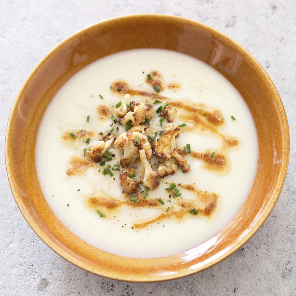 This undated photo provided by America's Test Kitchen in October 2018 shows creamy cauliflower soup in Brookline, Mass. This recipe appears in the cookbook “Cooking at Home with Bridget and Julia.” (Carl Tremblay/America's Test Kitchen via AP)